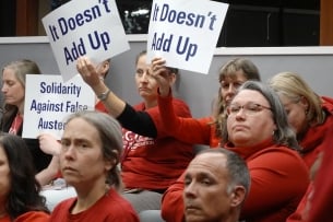 Staff and faculty union protesters at Lane Community College Board of Education meeting