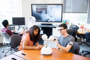 IU Bloomington students with robot